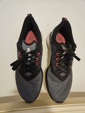 Nike Women’s Gray and Black Athletic Running Shoes with Pink Accents